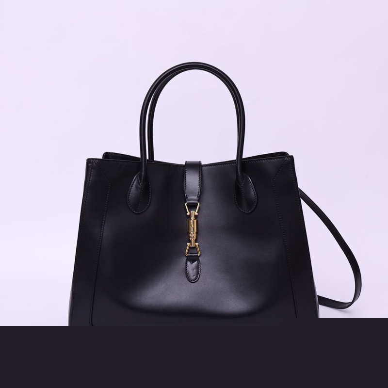 G*u*i top handle bags